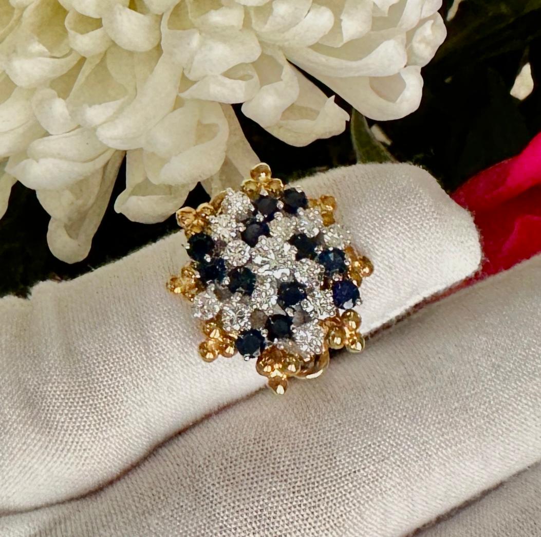 This is a gorgeous estate Diamond Sapphire Ring in 14 Karat White Gold with a removable 18 Karat Yellow Gold Halo.  The ring has exquisite quality Sapphires and Diamonds in an exuberant cocktail statement ring.  In the center is an approximately 1/4