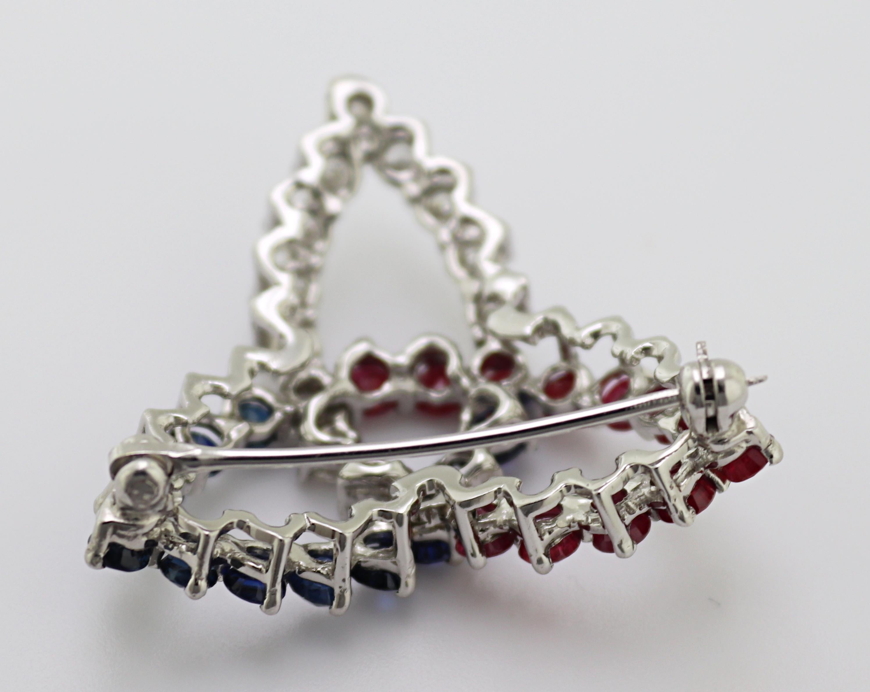 Round Cut Diamond, Sapphire, Ruby, 10K White Gold Trinity Knot Brooch For Sale
