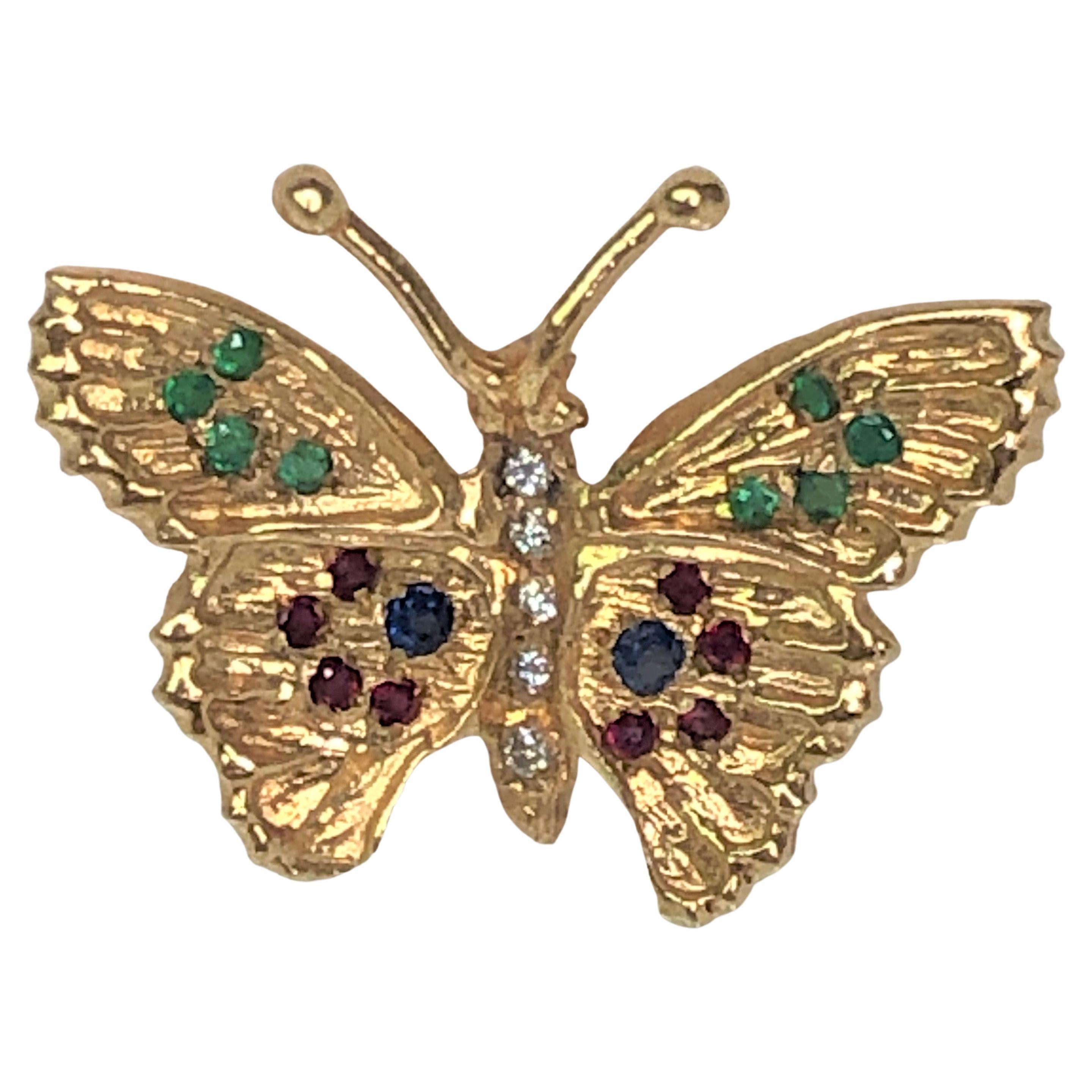 Broche papillon en diamant, saphir, rubis et émeraude