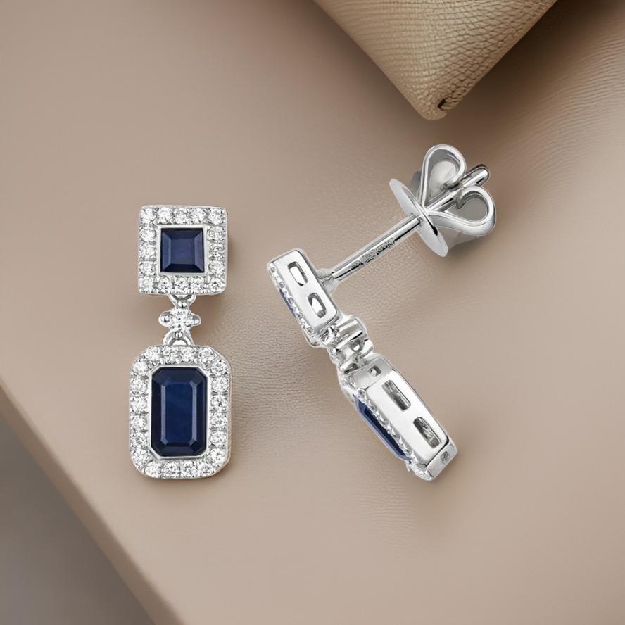 DIAMOND AND SAPPHIRE DROP EARRINGS

9CT W/G 74/0.20 4SAP/1.11

Weight: 1.7g

Number Of Stones:2+2+74

Total Carates:0.850+0.260+0.200