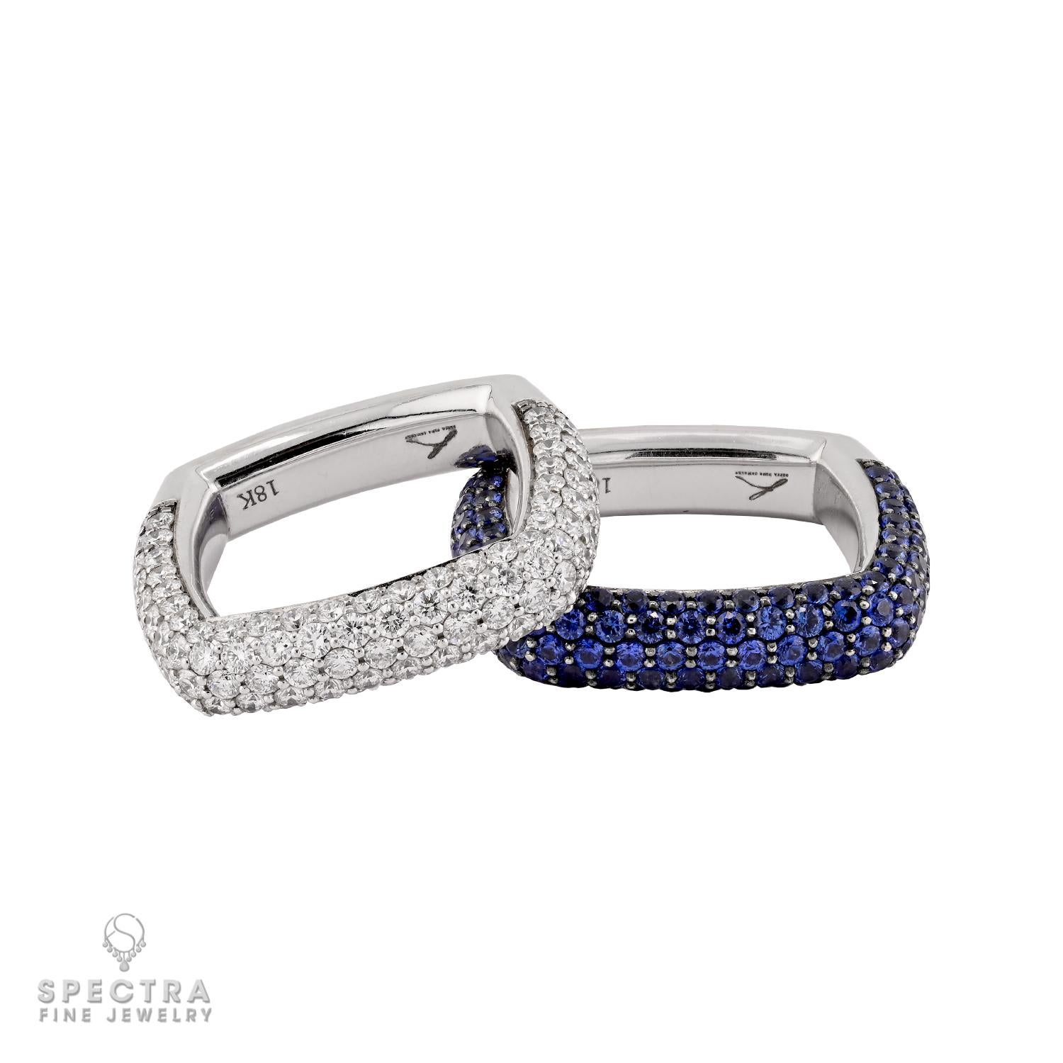 This captivating set of two square-shaped rings offers a modern twist on timeless elegance. One ring sparkles with pavé-set diamonds, radiating brilliance at every angle, while the other is enriched with pavé sapphires, displaying deep, velvety blue