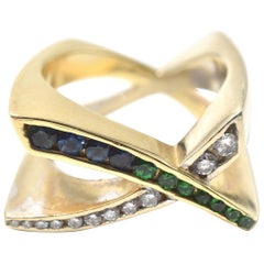 Diamond, Sapphire, Tsavorite 14 Karat Yellow Gold “X” Ring Diamond, Sapphire, Tsavorite 14 Karat Yellow Gold “X” Ring