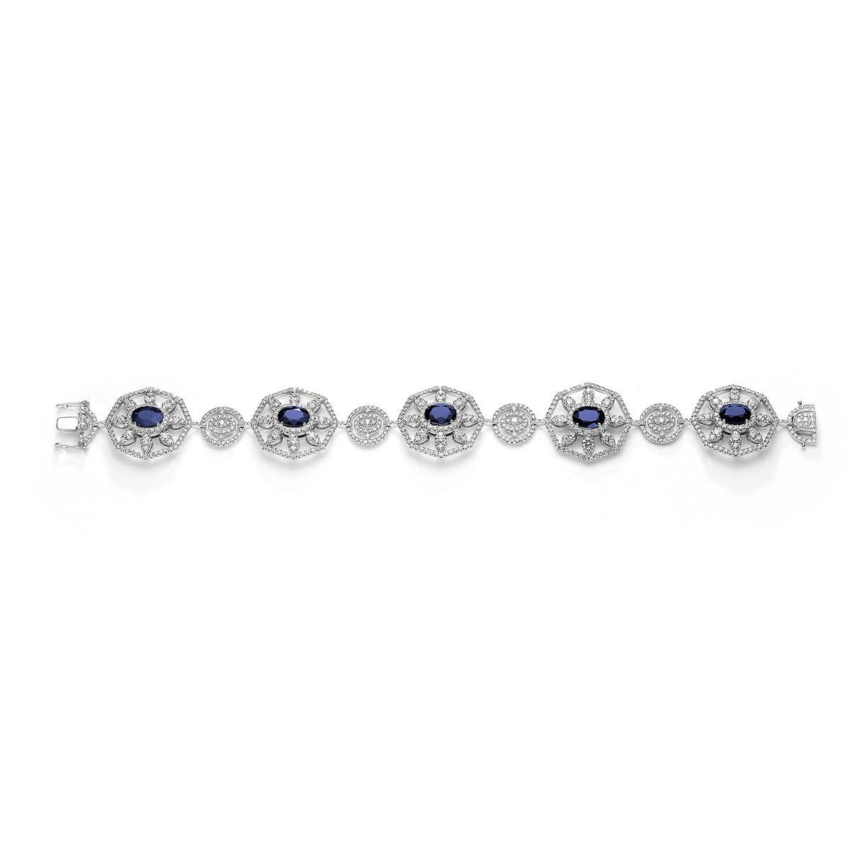 Bracelet in 18kt white gold set with 5 oval cut sapphires 7.37 cts and 661 diamonds 6.38 cts            