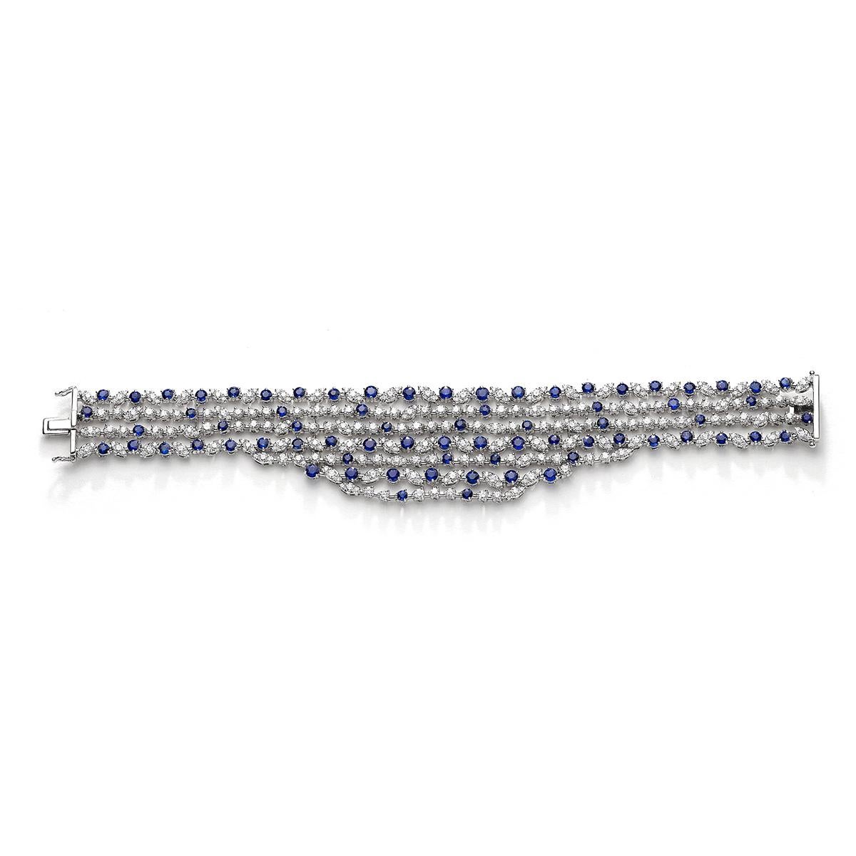 Bracelet in 18kt white gold set with 72 sapphires 9.40 cts and 302 diamonds 7.11 cts