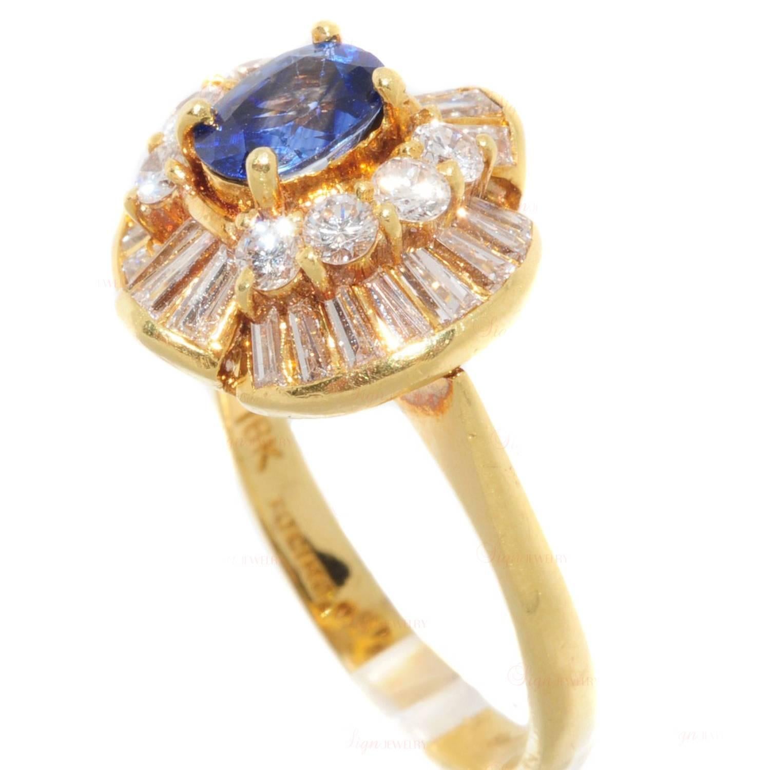Cette radieuse bague de cocktail a été fabriquée dans les années 1980 et présente une belle couronne avec un saphir bleu naturel serti à la broche et entouré de diamants, le tout en or jaune 18k. Mesures : 0.15 mm de largeur, 14 mm de longueur. 