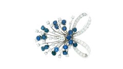 Diamond & Sapphires Swirl Top In Platinum Brooch