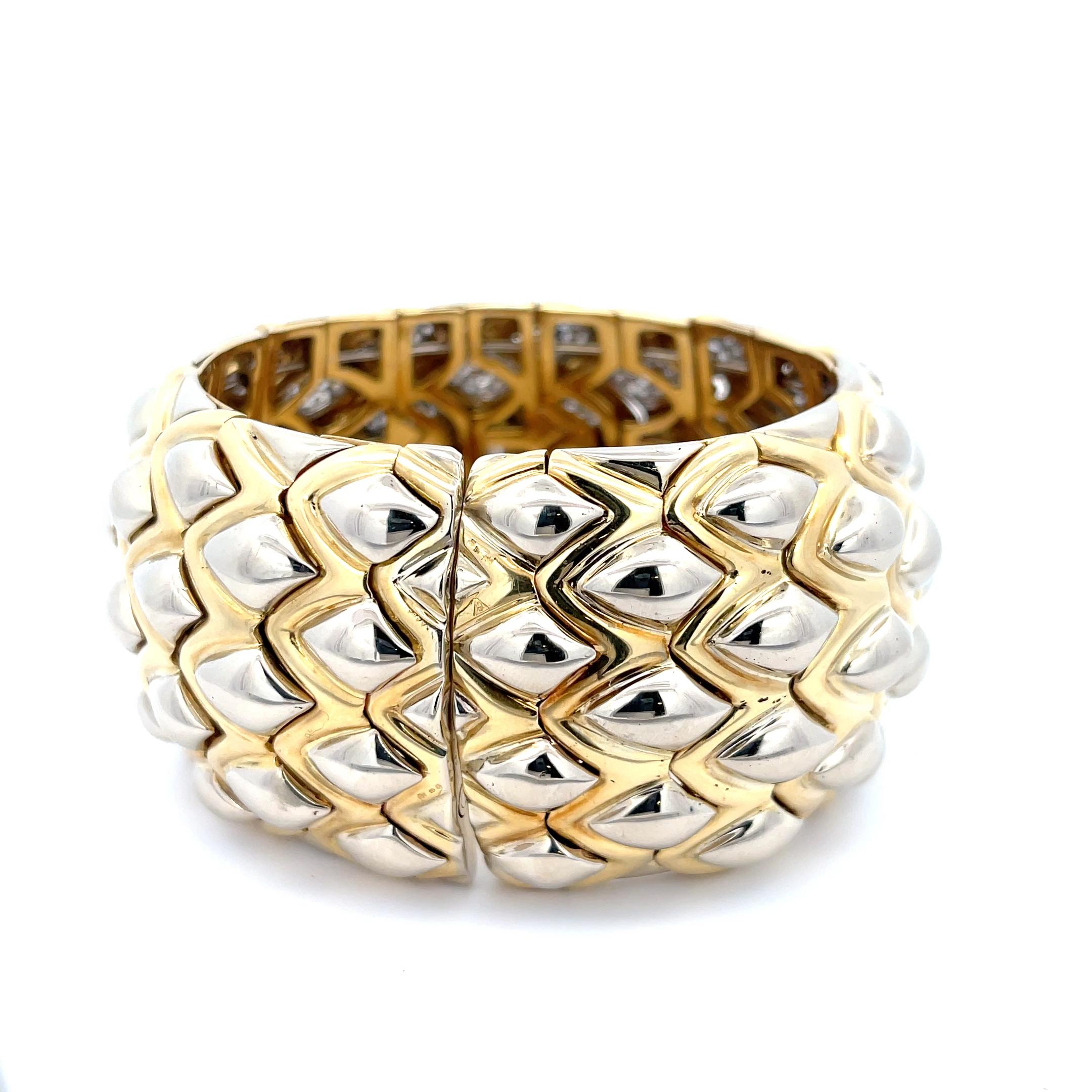 Diamond Scale Cuff in 18K White and Yellow Gold. The cuff features approximately 19ctw of pave set round diamonds. The cuff is 1.5