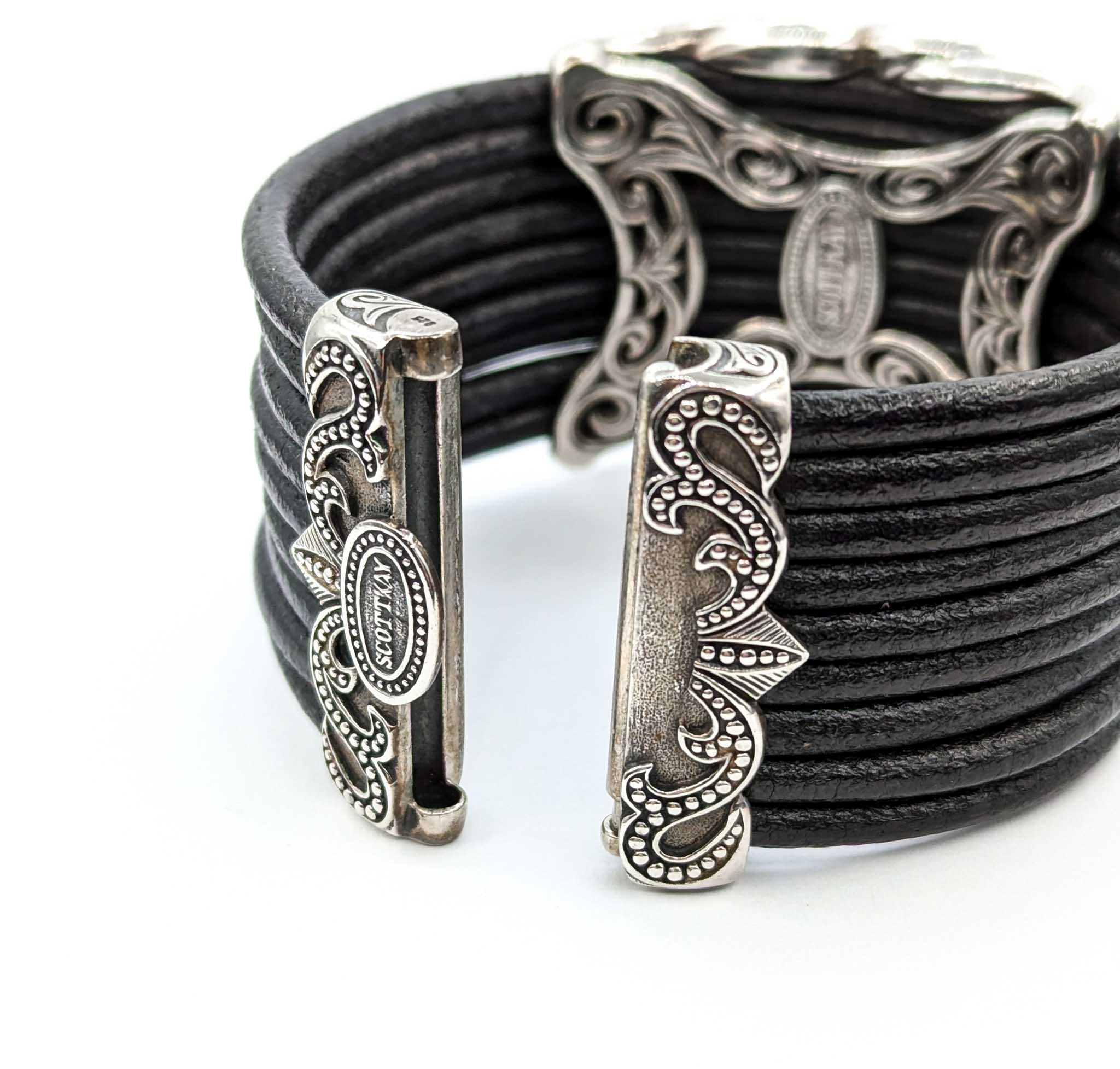 Diamond Scott Kay Bracelet in Sterling Silver & Leather

This beautiful Scott Kay bracelet is crafted in sterling silver and features 1.50ctw of diamonds, adding a touch of luxury to the leather multi-strand design. The diamonds are SI clarity with