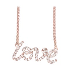 Collier pendentif script LOVE en diamants 0,16 carat et or 18 carats