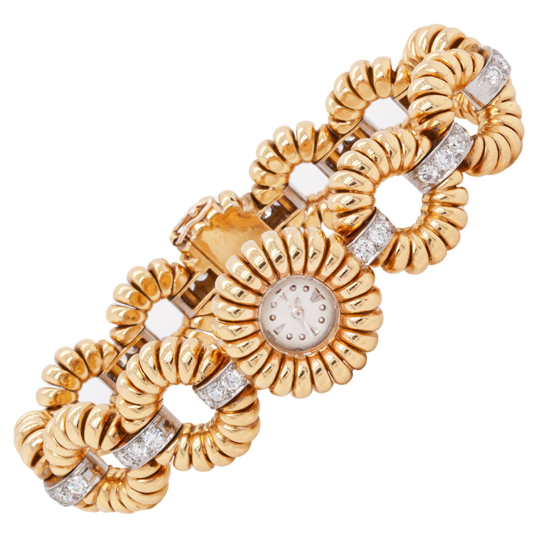 Van Cleef & Arpels Bracelet montre vintage en or jaune et blanc 18 carats serti de diamants en vente
