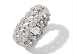 Pulsera engastada con diamantes talla princesa y brillante en oro blanco de 18 quilates