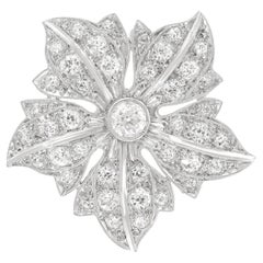 Colgante broche engastado con diamantes
