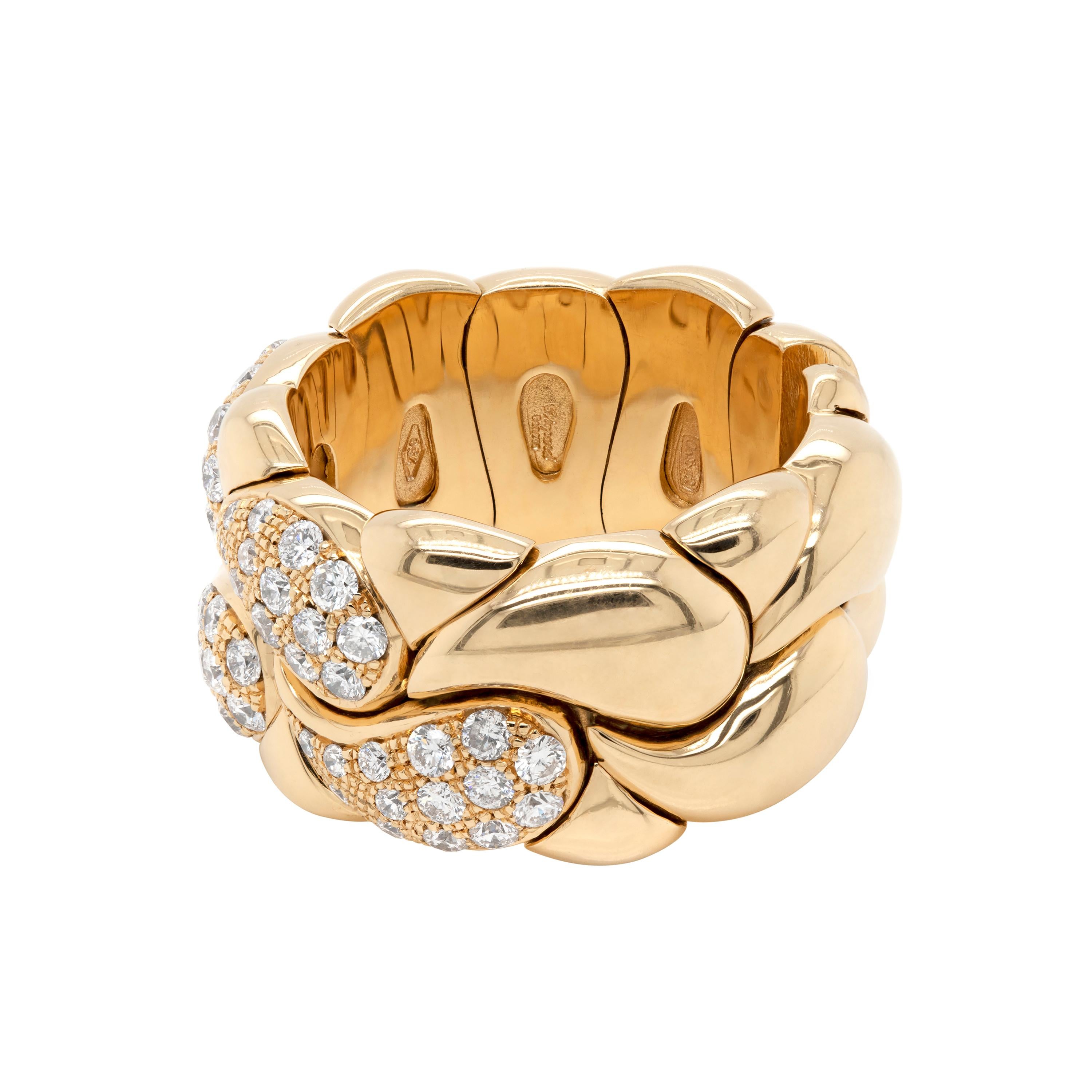 Chopard flexi ring from their classic Casmir collection set with 56 fine quality round brilliant cut diamonds weighing a total of 0.78 carat all pave set in 18 carat yellow gold. The diamonds have been after set on the original Chopard ring to