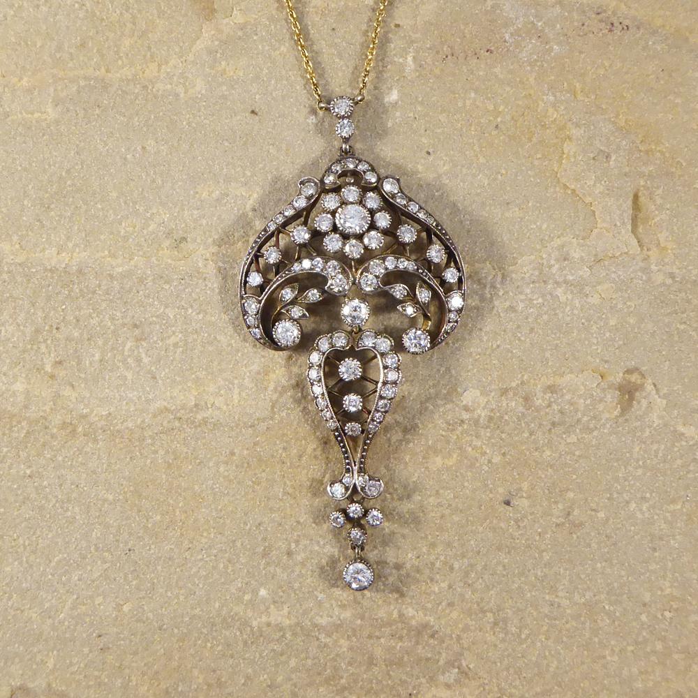 This gorgeous necklace is contemporary but has been made resembling an Edwardian style, with such delicate and superb detailing to reflect the beauty and decadence of this era. It has an 18ct Yellow Gold back and Silver front with a 18ct Yellow Gold