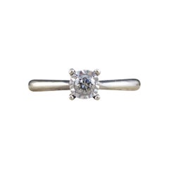 Diamond Set Illusion Effect Solitaire Ring Modelled in 9ct White Gold