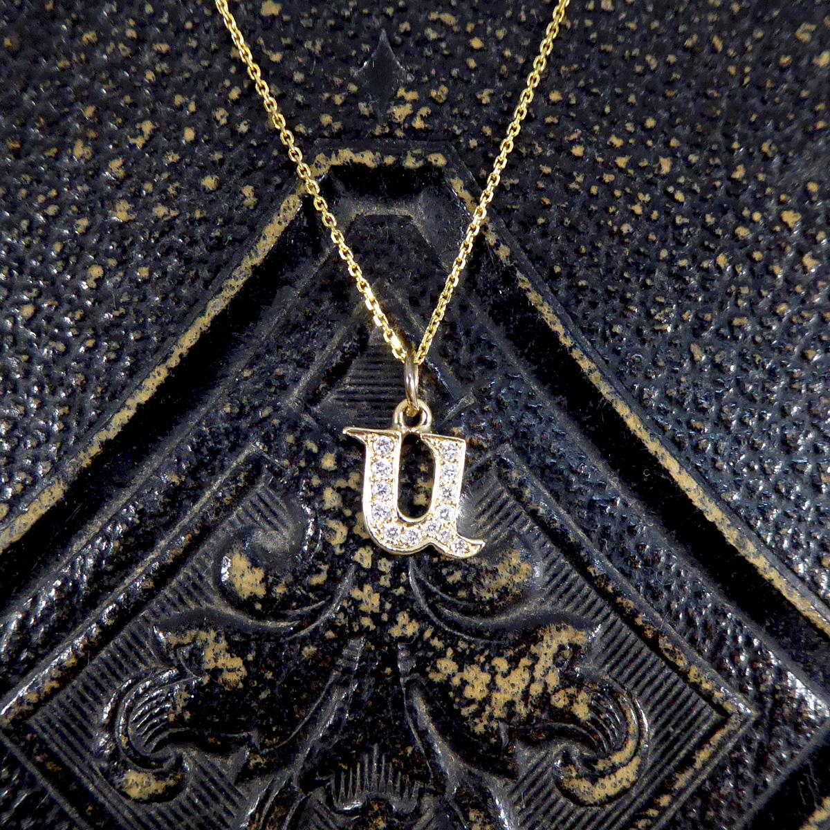 The perfect gift of a Gold Diamond set initial necklace. So elegant and dainty the initial 