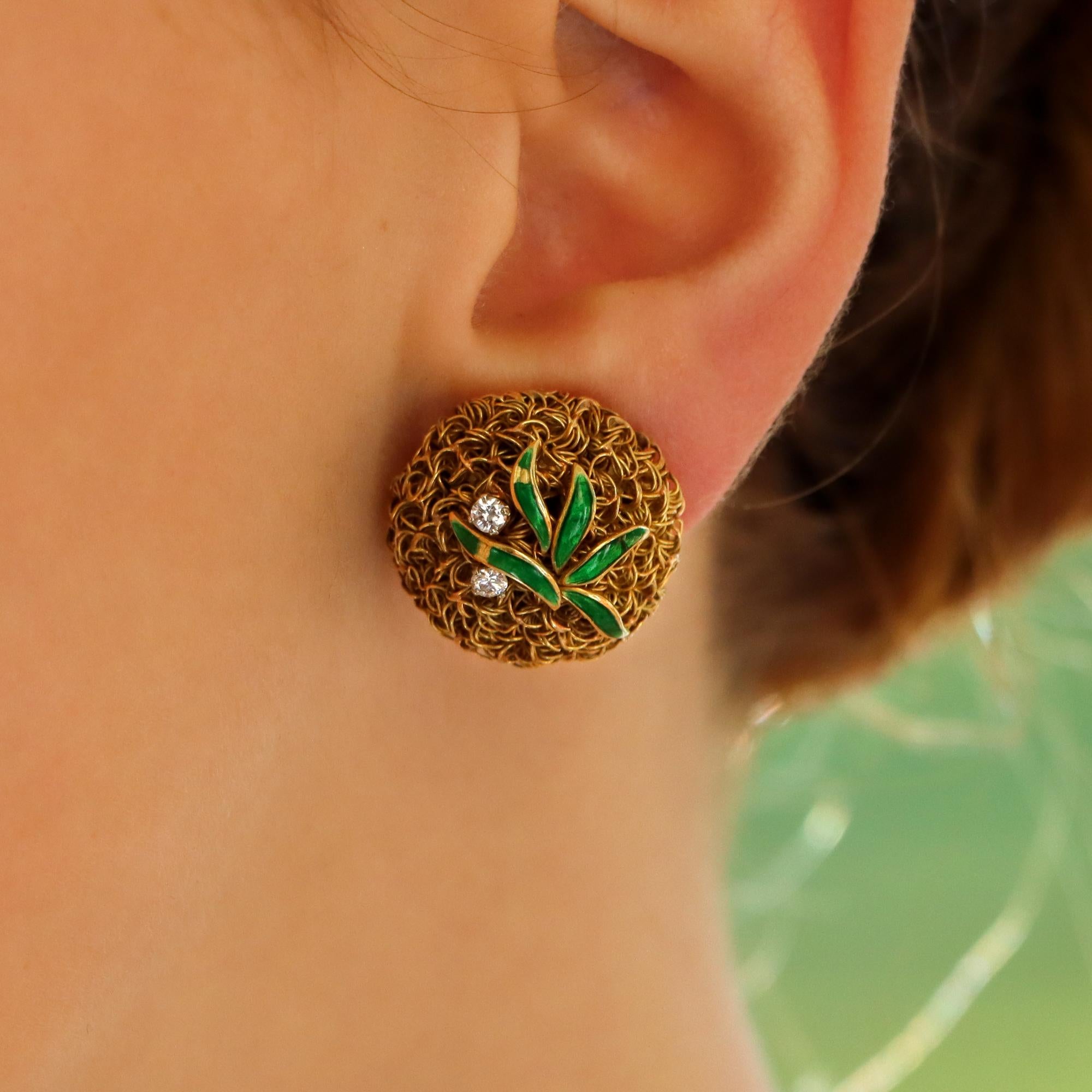A textured pair of 18ct yellow gold wire-work ear clips set with vibrant green enamel and two round brilliant cut diamonds. 

The wire-work is hand formed into a dome and adorned and are supposed to depict pineapples with green guilloche enamel