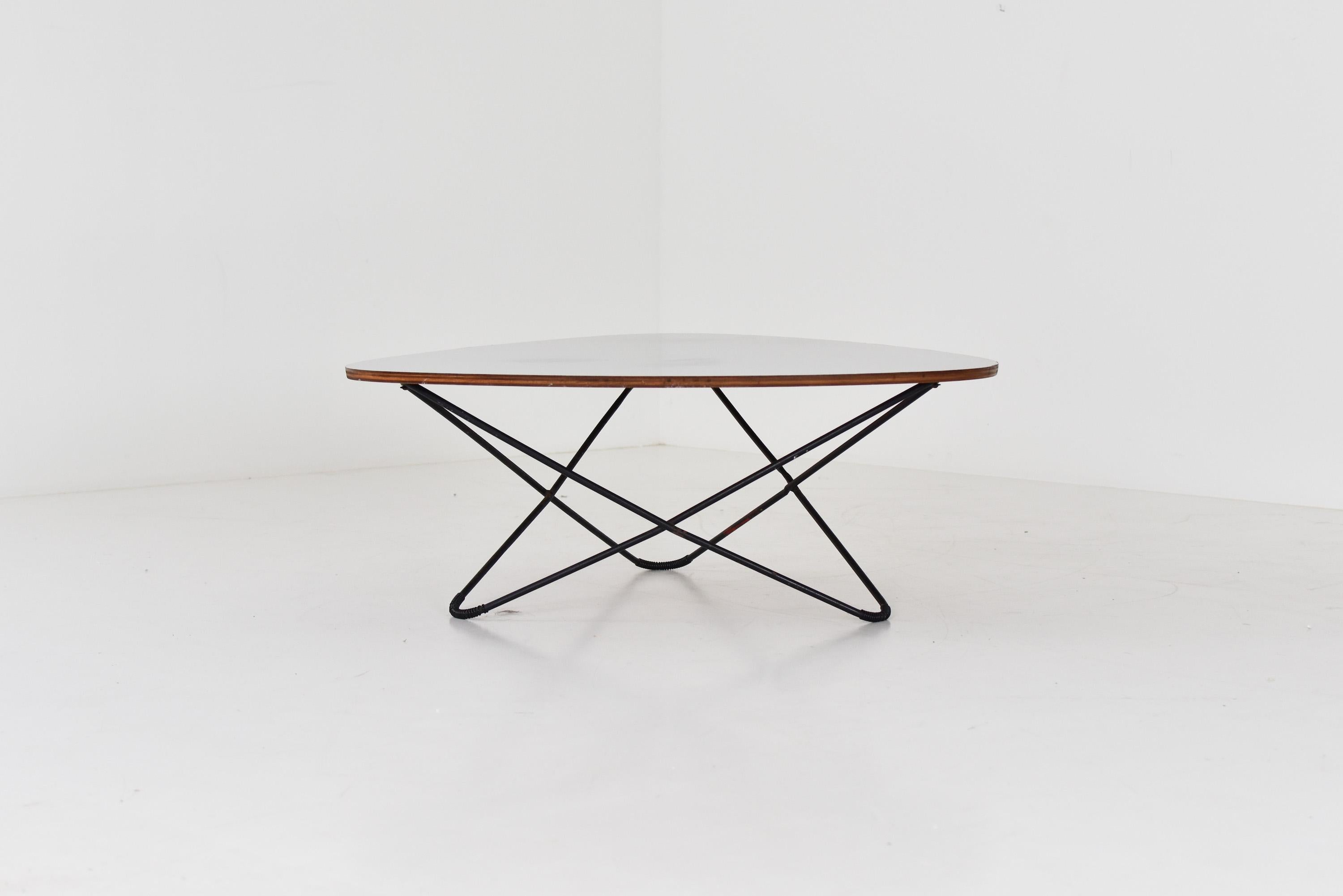 Diamond shaped coffee table by Florent Lasbleiz manufactured by Airborne France in 1954. This table has a grey laminated top, resting on a black lacquered steel base. Small veneer damage, as seen on the pictures, but overall in a very beautiful and