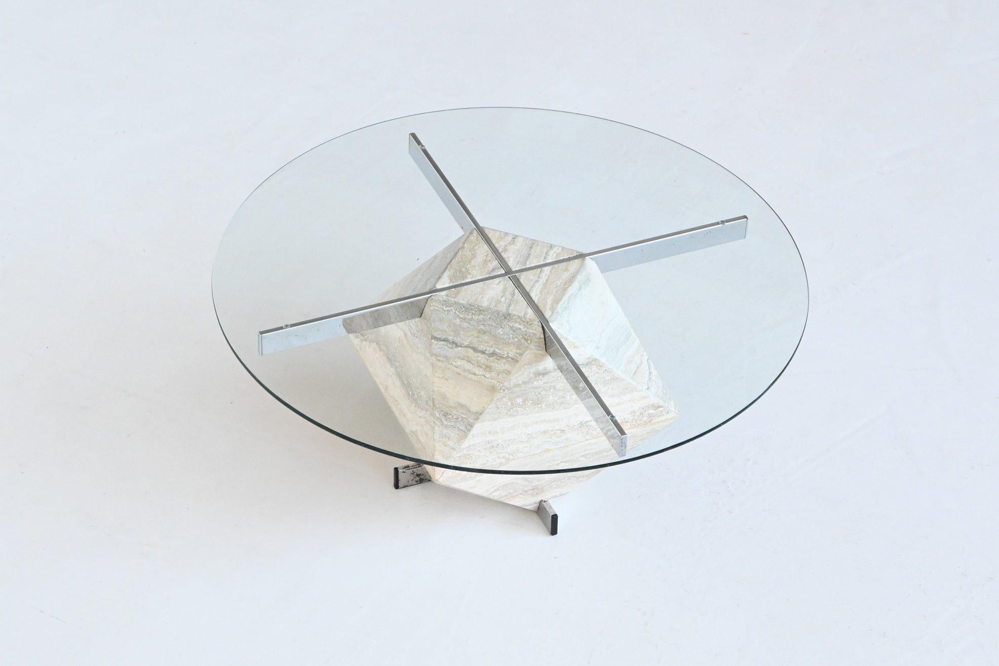 Beautiful and unique diamond shaped coffee table by unknown designer or manufacturer, Italy 1970. This handcrafted table is made of beautiful travertine and feature a stunning pattern and texture. It has a round glass top which is supported by a