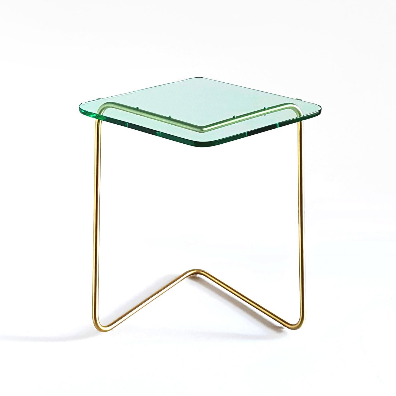 The diamond side table by Rita Kettaneh 
Dimensions: The base: brushed stainless steel plated with brass
 Optionally plated with copper or brass
 The top: acrylic
Materials: H 42 x W 45 x D 34.5 cm
Weight: 2.65 Kg

Colors and finishes:
