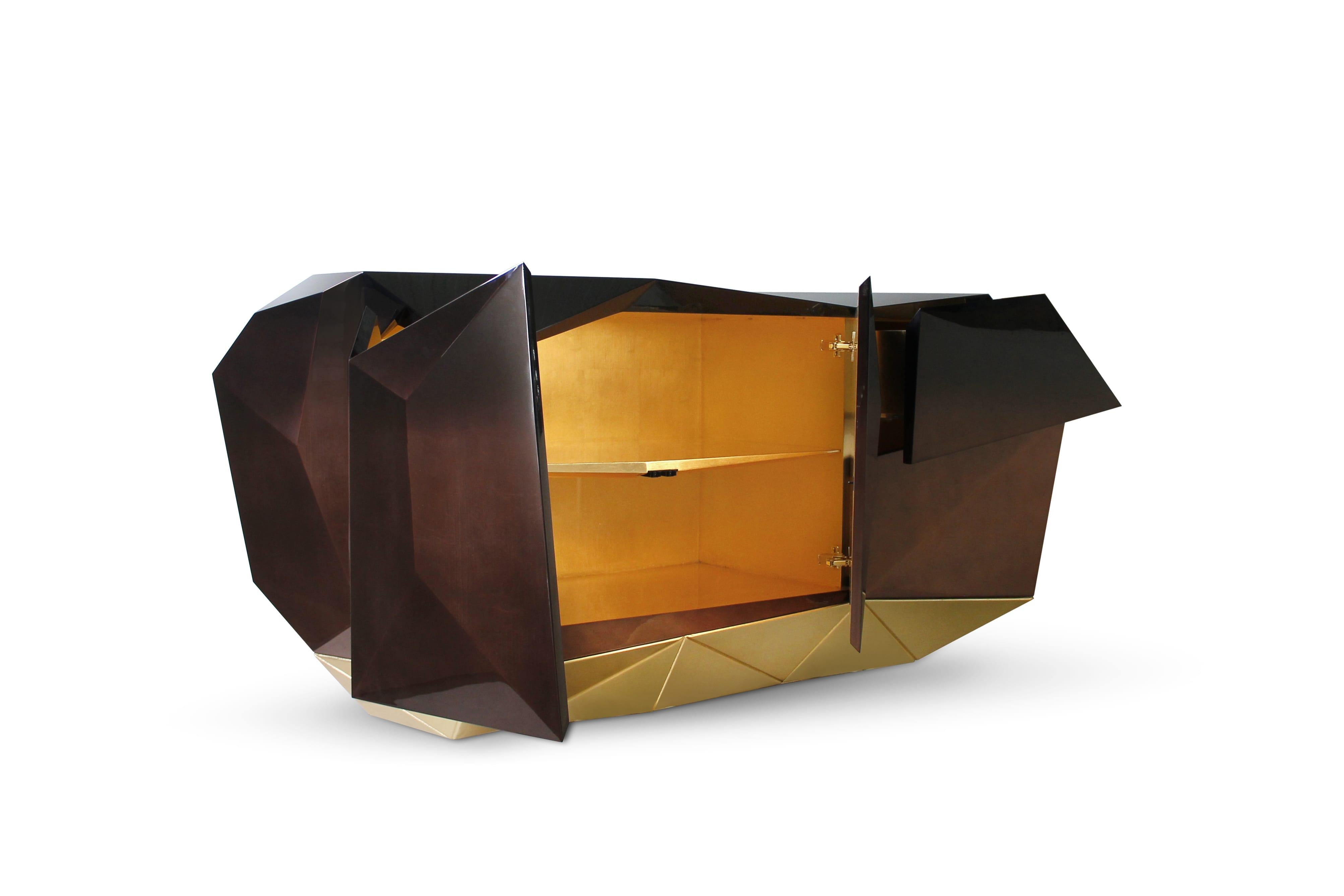 With the style of a precious jewel, the new Diamond sideboard, colored in chocolate brown, will make a splash in interior design. Like the amethyst Diamond, the new sideboard also features two highly sculptured doors leading to a gold leaf interior