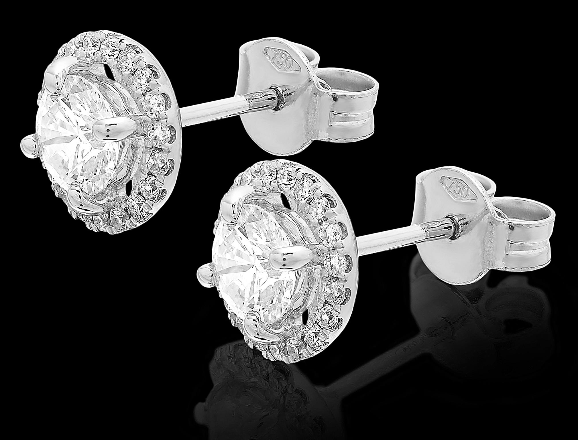 Modern Diamond Single Stone Solitaire Stud Surrounded by Halo Cluster 1.20 ct Earrings For Sale