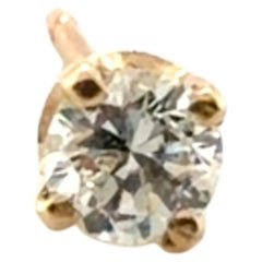 Orecchino singolo con diamante estratto .25ct F SI1 in oro giallo 14K a 4 punte
