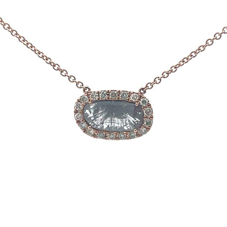 Introducing our stunning natural gray diamond slice necklace, the perfect accessory to add elegance to any outfit. It features an cushion diamond slice with a total weight of 1.34 carats, surrendered by round white diamonds, delicately hanging from