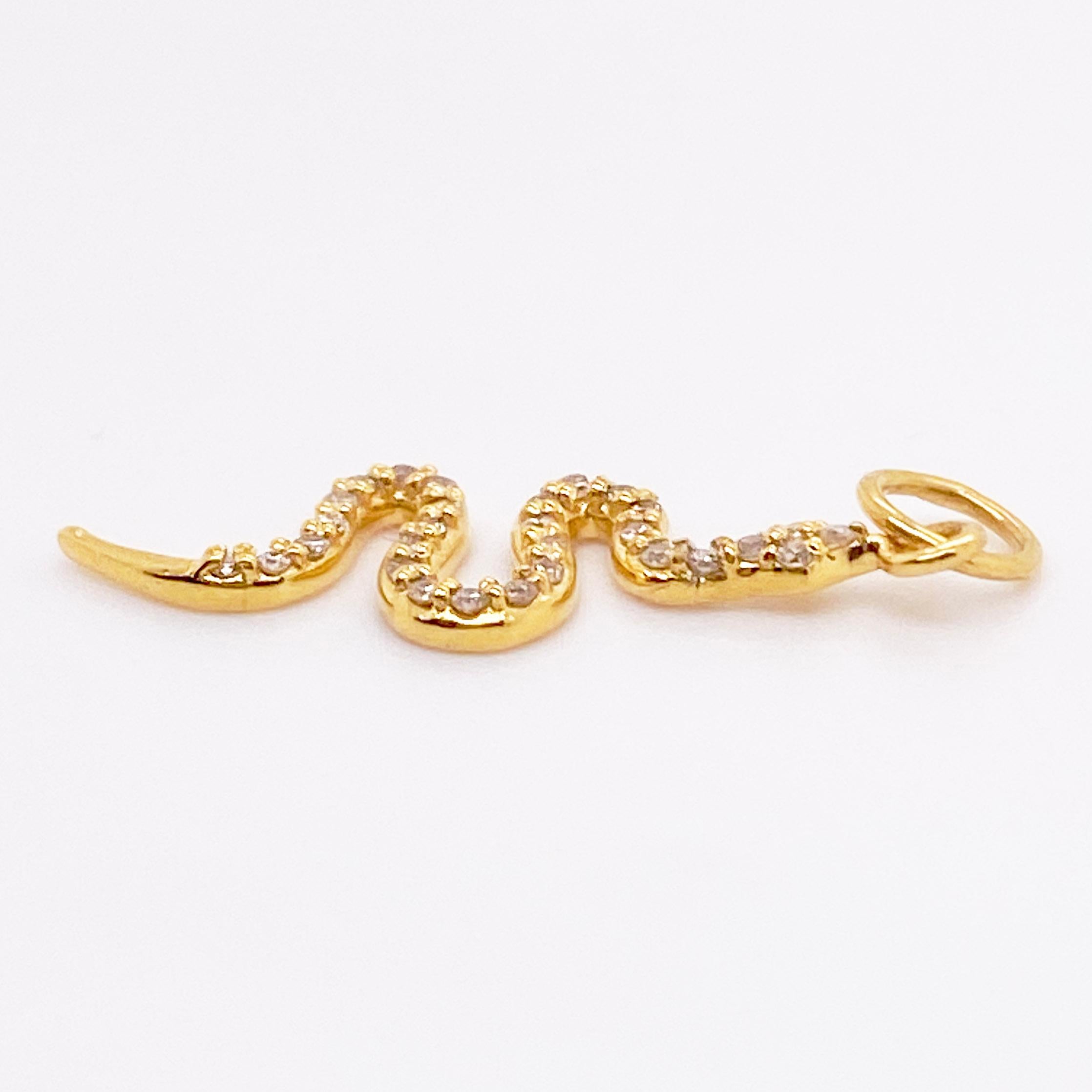 Snakes are the fashion statement of the year! They have shown up in clothes, accessories, and jewelry. Jump on the trend with this beautiful snake pendant that has 28 round brilliant diamonds falling down its back. The details for this gorgeous