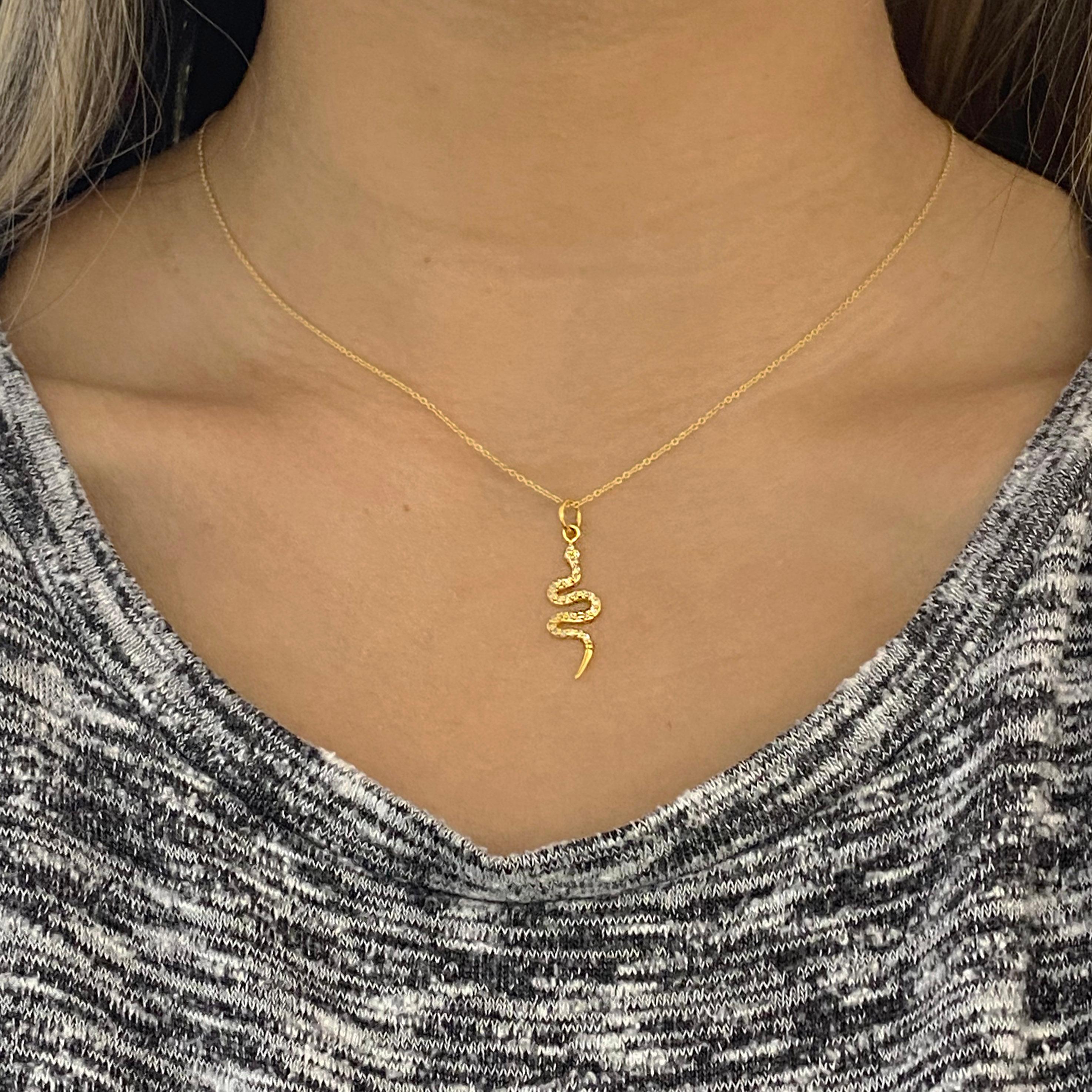 solid gold snake pendant