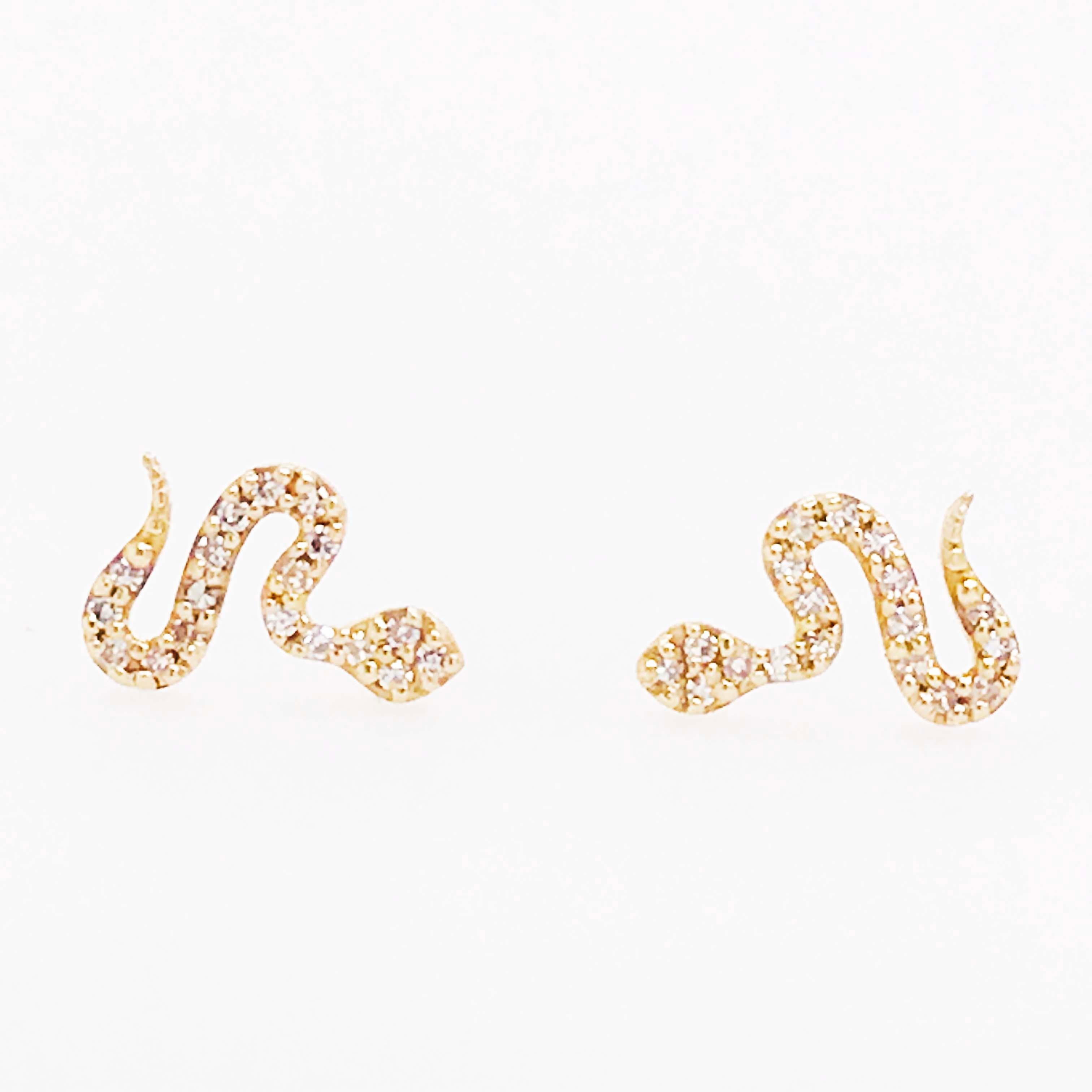 How adorable are these snake earring studs? These dainty diamond snake earrings are so much fun to wear and so adorable! They add character to every attire! The dainty serpent earrings have round brilliant diamonds pave set on the top on the