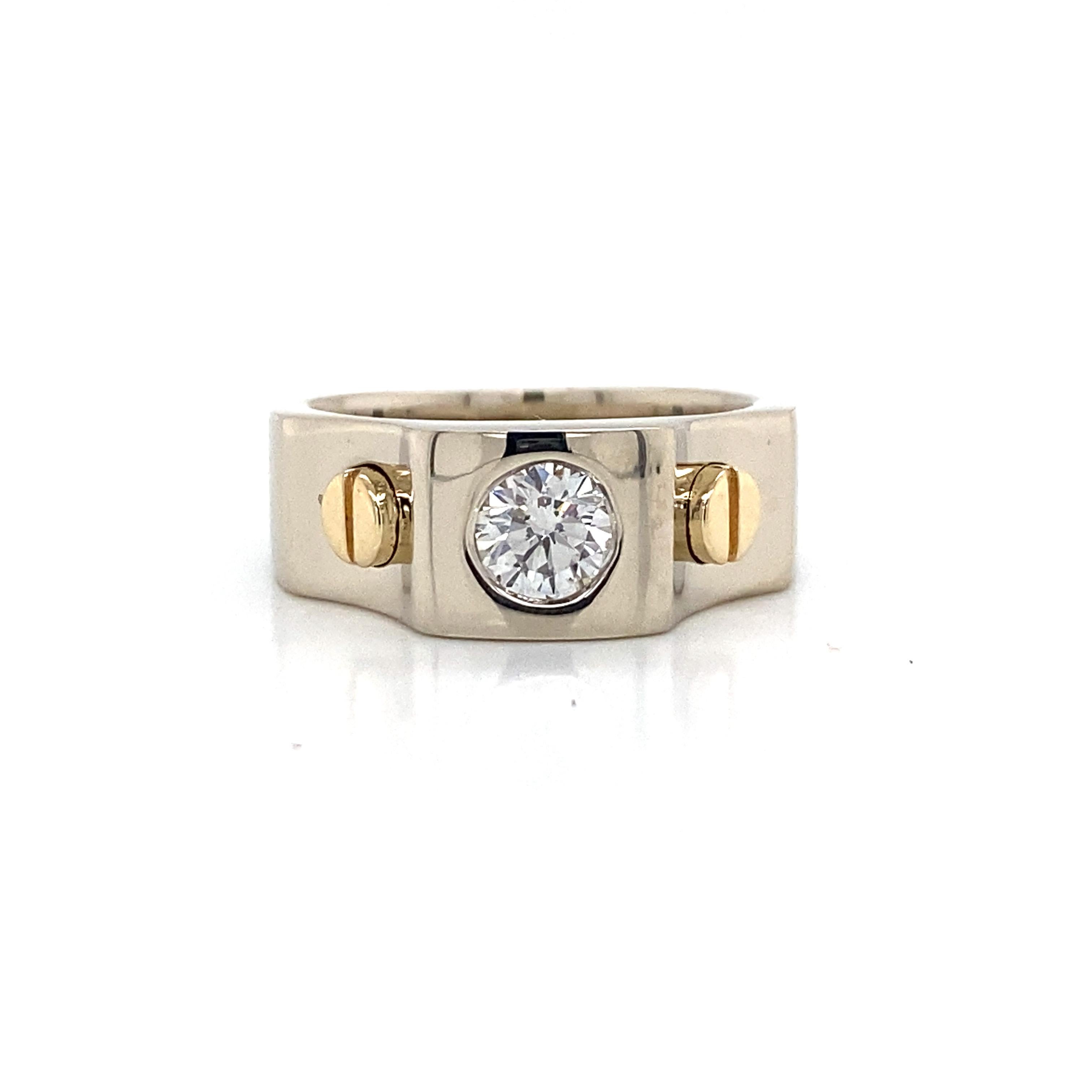 Diamond Solitaire 14K Yellow Gold Gents Band Ring.  (1) Round Brilliant Cut Diamond weighing 0.75 carat total weight, G-I in color and VS in clarity is expertly set.  The Band measures 5/16 inch in width. Ring size 7.5. 11.9 grams.