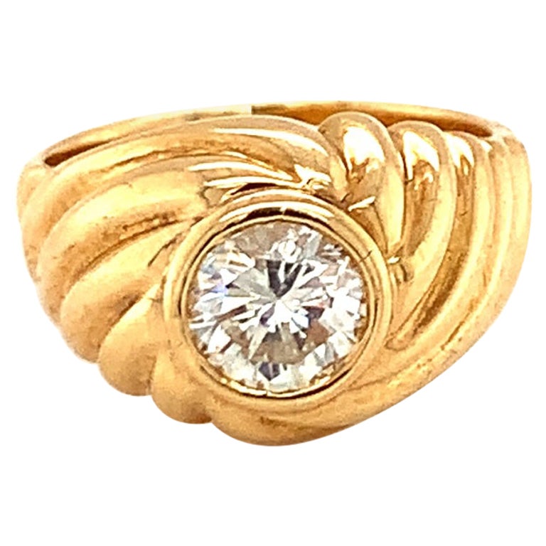 Bague en or jaune 18 carats avec solitaire en diamant, vers les années 1980