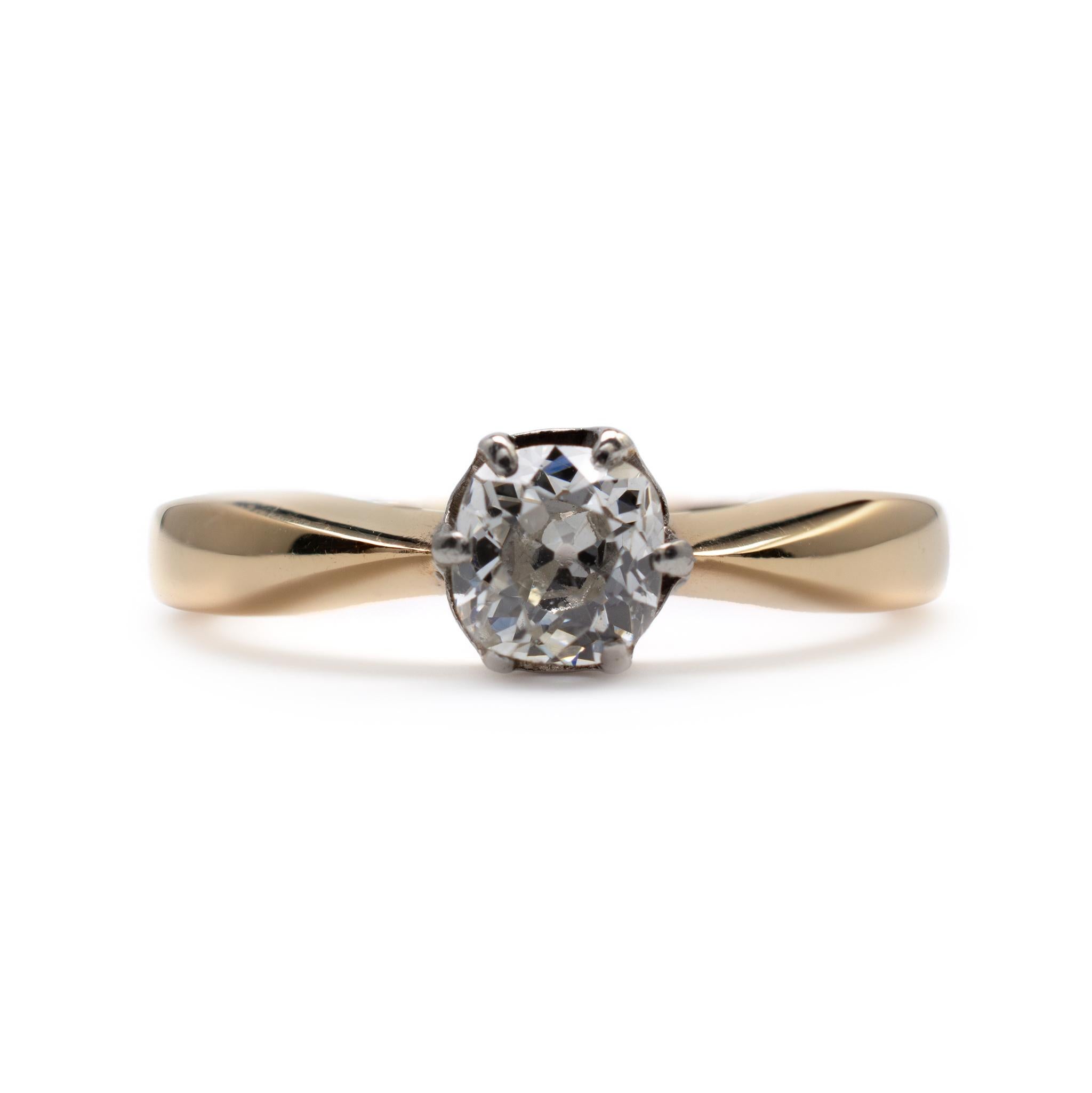 This diamond solitaire engagement ring is set with a cushion-cut 0.50-carat diamond.

Crafted in 18ct yellow gold, the shank has beveled edges with pinched reverse tapered shoulders. The diamond is neatly secured into a decorative rex style