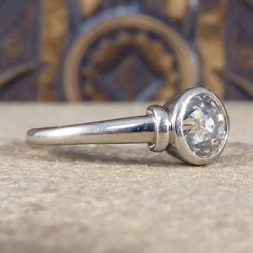 This lovely antique 0.87ct Old English Cut Diamond has been mounted into a lovely collar set Platinum shank. With clear hallmarks on the inside this ring has been hand crafted in 1997 in London from Platinum and would make a lovely engagement ring.