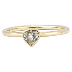 Anillo solitario de diamantes en forma de corazón