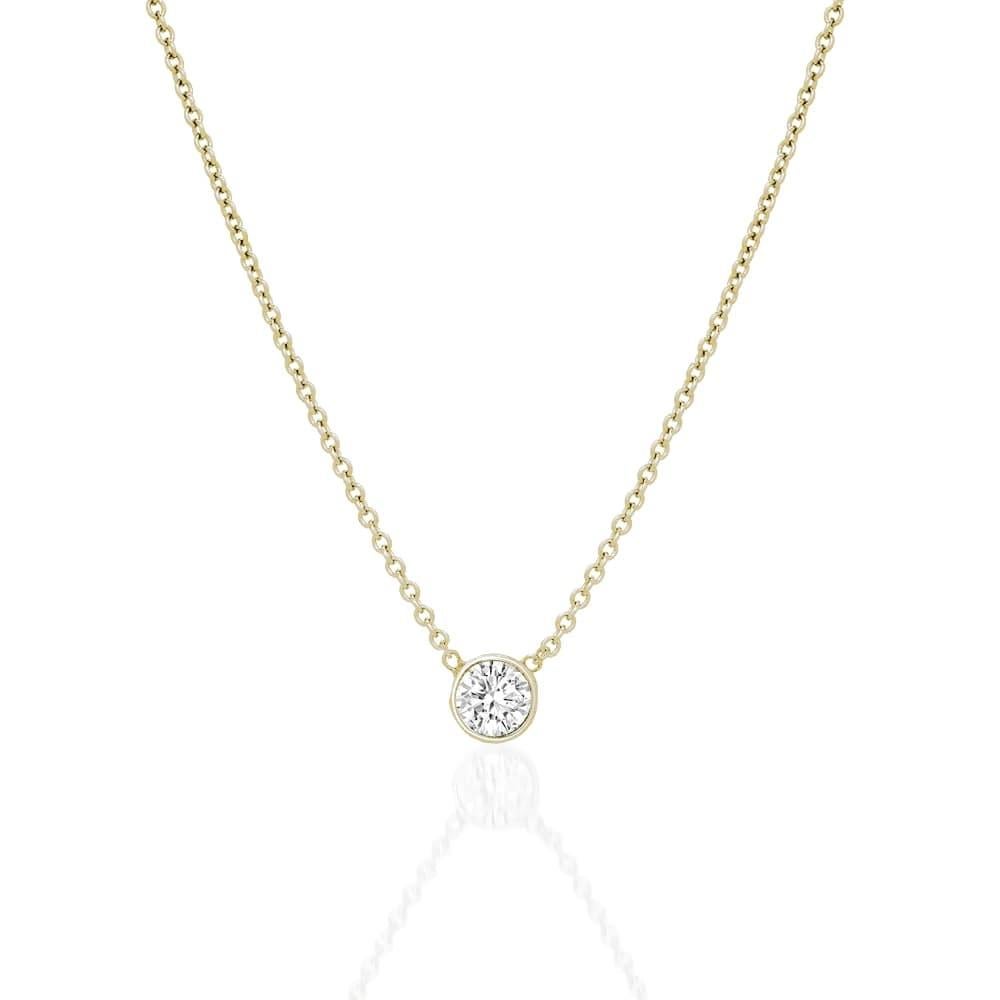 Moderne Collier pendentif solitaire en or 14 carats avec lunette en diamants en vente