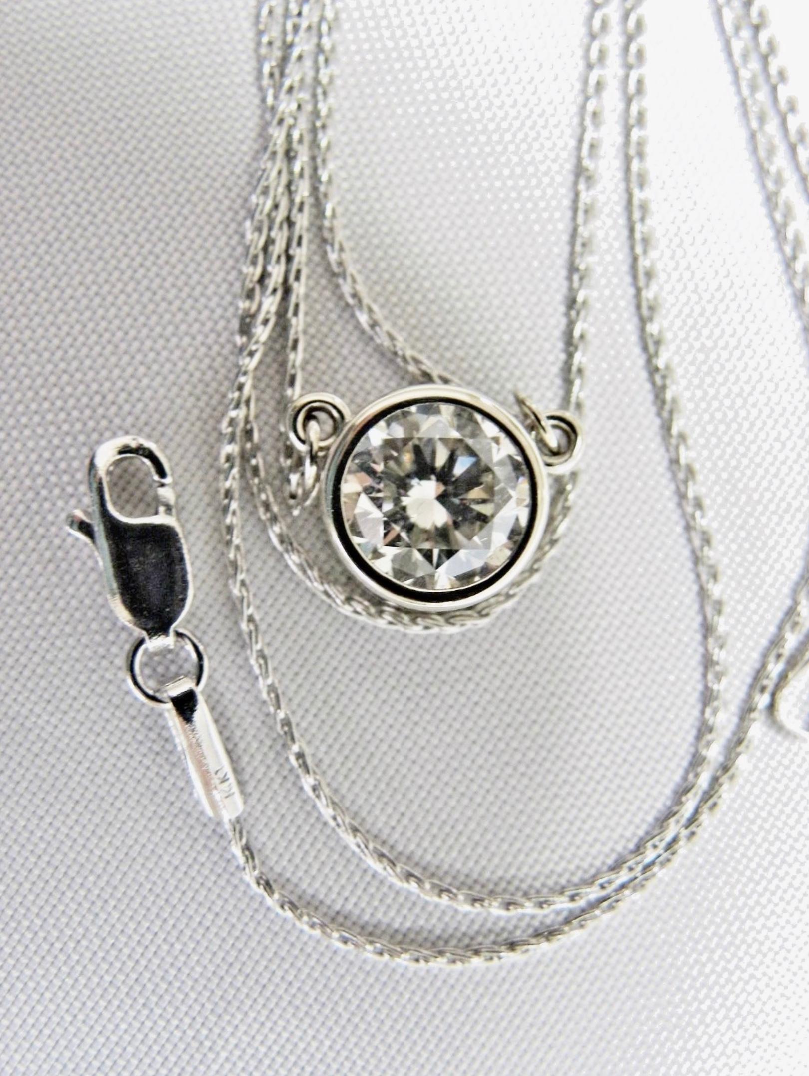 Contemporary 1.50 Carat Round Diamond Solitaire Pendant Necklace For Sale