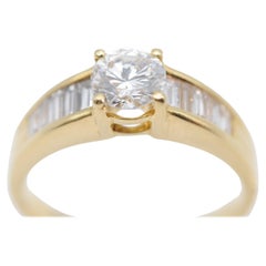 Anello con solitario di diamanti 1,05ct VVS1, River(D) con pietre baguette