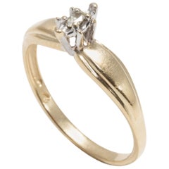 Retro Diamond Solitaire Ring, 14 Yellow and White Gold Raised Setting, .05 ct Marquise