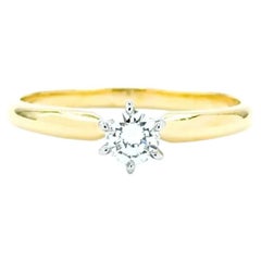 Anello con solitario di diamanti in oro giallo 18k e platino