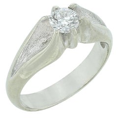 Diamond Solitaire Ring in Curved White Gold