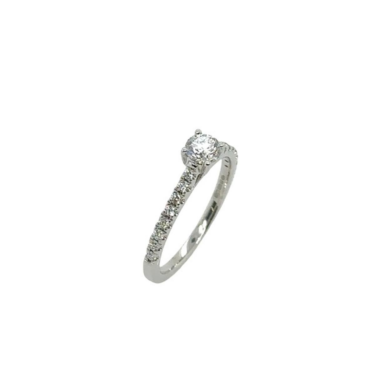 An elegant Diamond ring for your engagement, set with 0.30ct round brilliant cut natural Diamond main stone in 18ct White Gold 4 claw setting, and 16 Diamonds on shoulders, 0.10ct .

Additional Information:
Total Diamond Weight: 0.30ct &