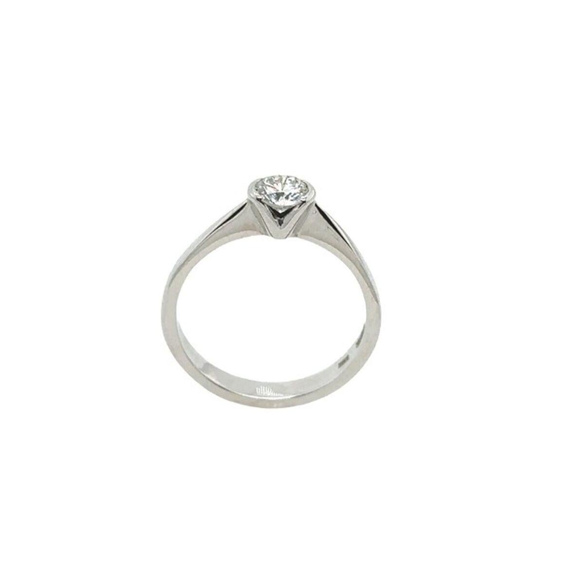 Round Cut Diamond Solitaire Ring Set with 0.34ct H/VS2 Natural Diamond in 18ct White Gold