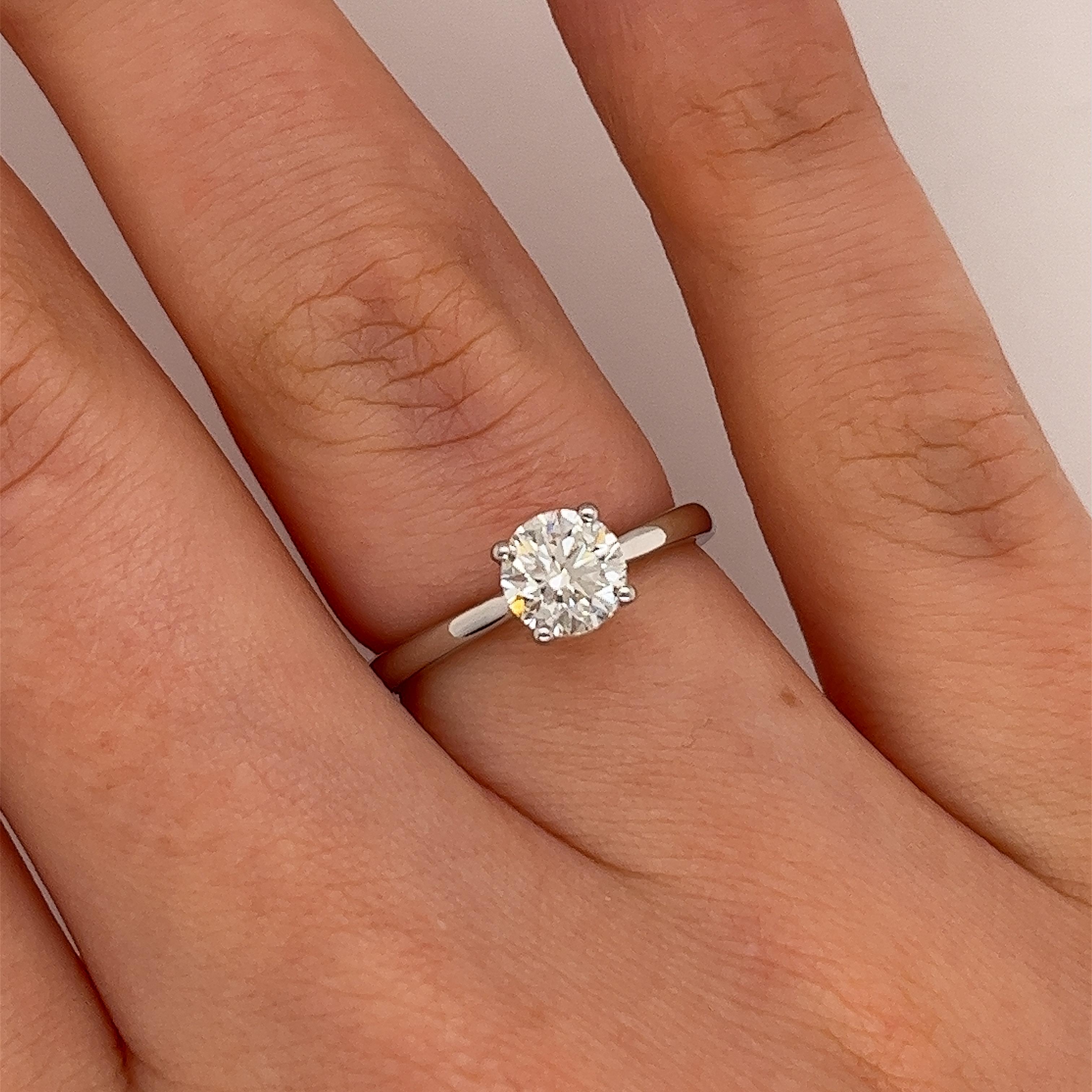 This gorgeous solitaire diamond ring set with 0.80ct I/SI1 round brilliant cut diamond  
in platinum setting can make a perfect engagement ring.
Total Diamond Weight: 0.80ct
Diamond Colour: I
Diamond Clarity: SI1
Width of Band: 2.30mm
Width of Head: