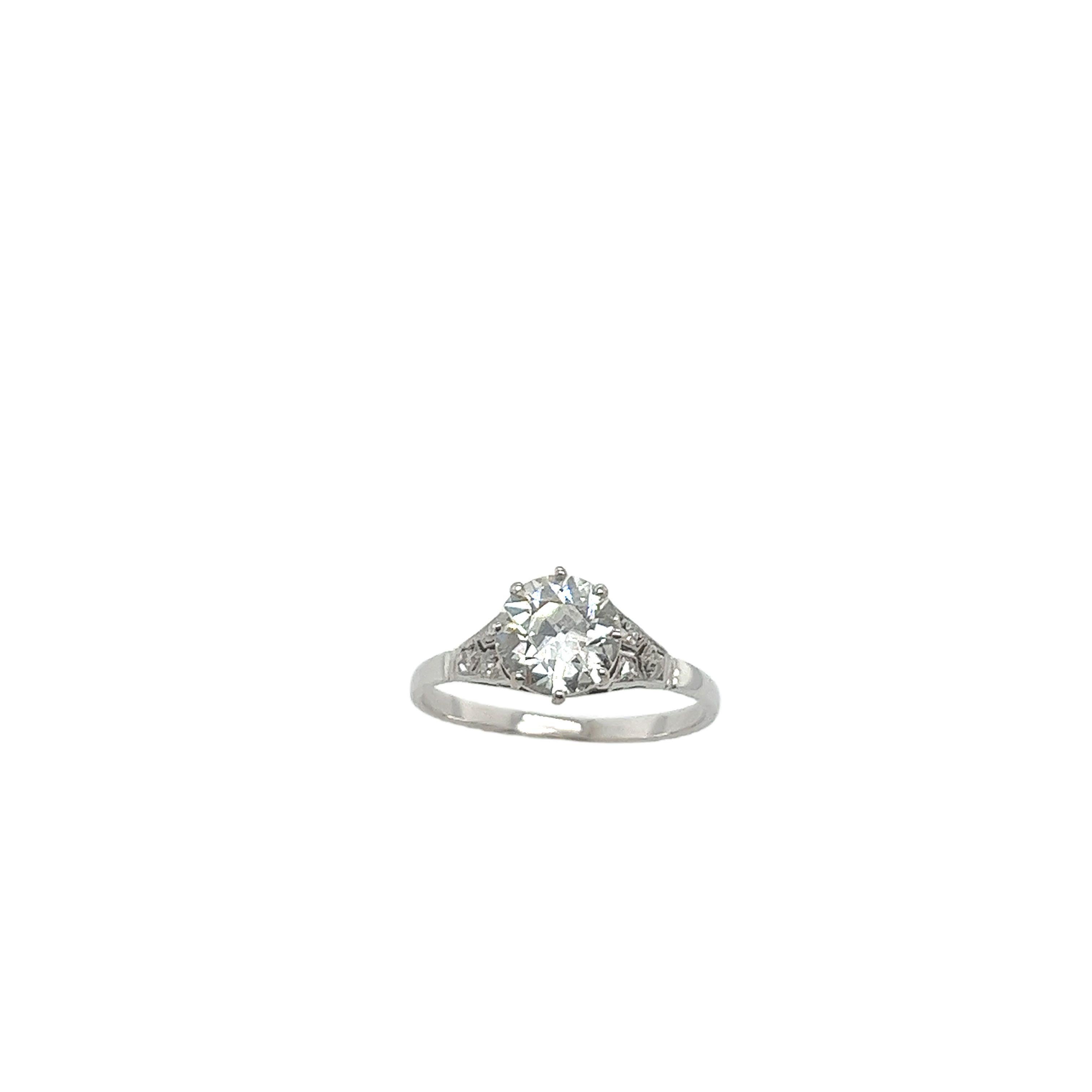
This vintage diamond ring features 1 beautiful round old cut diamond 1.63ct set with 3 small diamonds on each side.
The 18ct white gold setting is both timeless and classic and completes the overall look of this gorgeous set.

Total Diamond Weight: