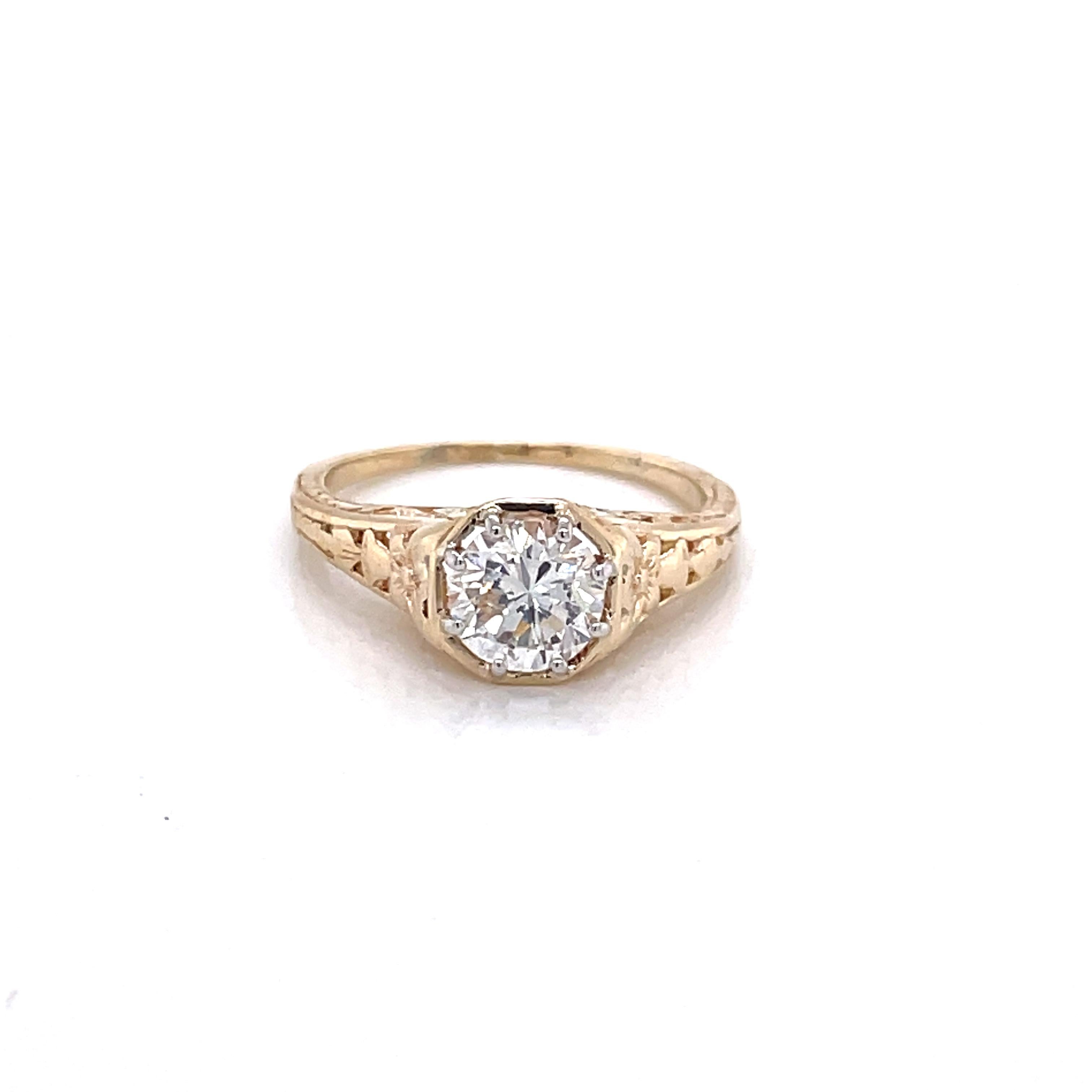 Timeless, a solitare ring is always in vogue. Its beautiful fourteen karat 14K yellow gold antique setting shows off a modest rose cut I/VS1 diamond, .80 carat total weight.  In size 4.75 and resizable. Gift boxed. 