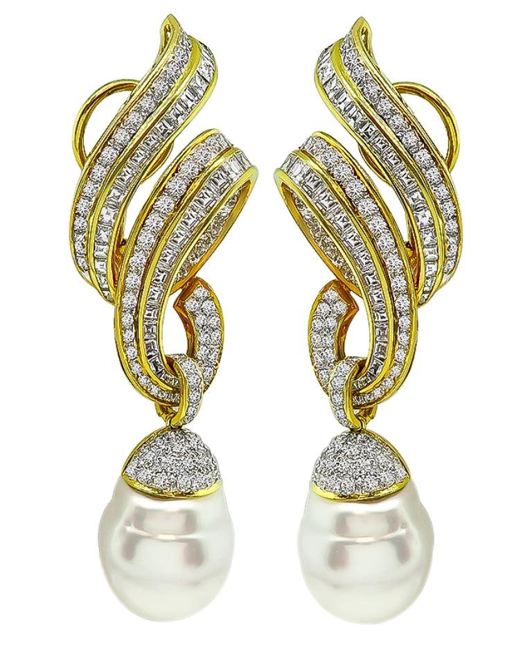 This elegant pair of 18k yellow gold day and night earrings feature sparkling round and carre cut diamonds that weigh approximately 10.00ct. graded G color with VS clarity. The diamonds are accentuated by lovely south sea pearls. The earrings