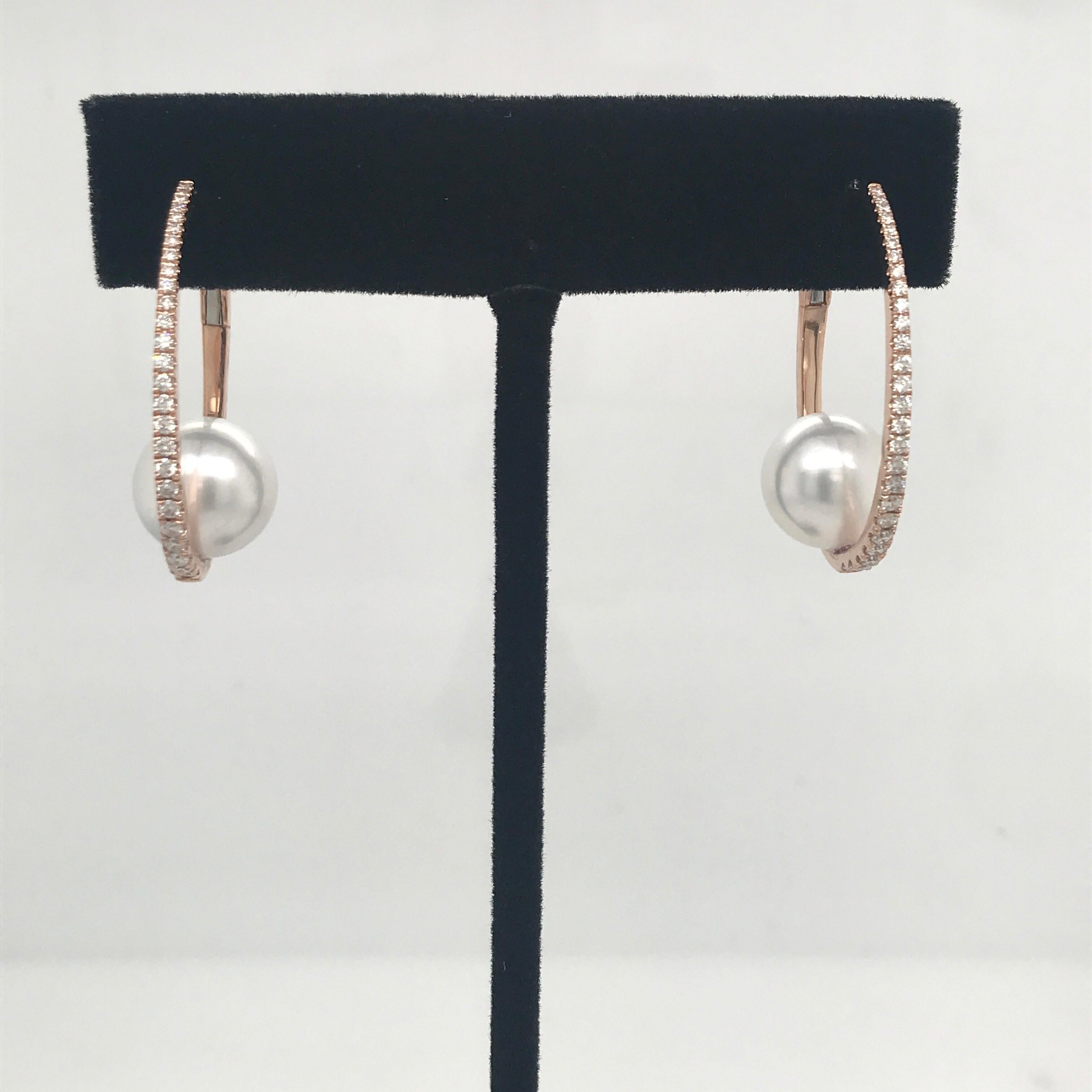 18K Rose Gold diamond hoop earrings weighing 0.55 carats with a 10-11 mm White South Sea Pearl. 
Available in all gold & pearl colors. 