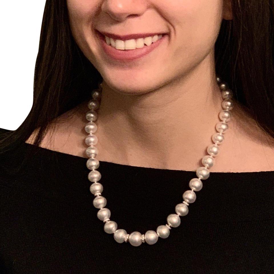 CERTIFIED $15,450 LARGE SOUTH SEA WHITE 13-10 MM SIZE PEARLS WITH 18 1/4 INCHES IN LENGTH WITH A BEAUTIFUL 14 KT SOLID GOLD DIAMOND CLASP WITH DIAMOND RONDELS

Nothing says, “I Love you” more than Diamonds and Pearls.

THIS IS A UNIQUE, HANDMADE,